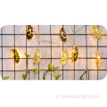 Lampade in ferro da ragazza con luci di fascia alta con foglie d&#39;oro vuote